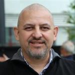Associate Professor Jason Paul Mika
